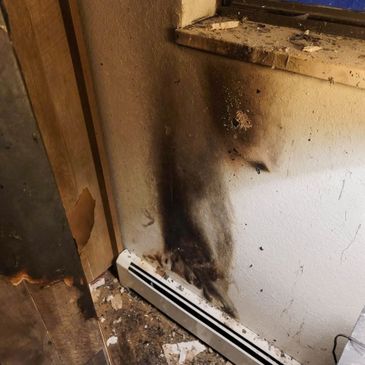 Home damaged by fire requiring rebuild support
